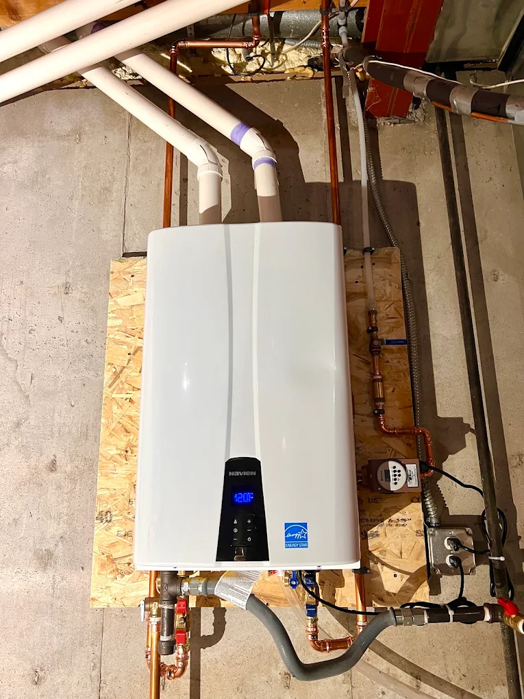 Navien high efficiency condensing on-demand tankless water heater wall mounted installation with direct venting